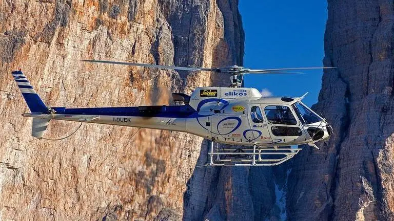 Video shows man dangling in air after parachute gets caught on helicopter’s tail rotor Russia: Video shows man dangling mid-air following a parachute malfunction