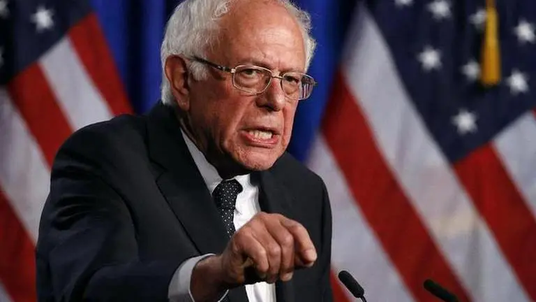 Sanders backs Biden as ex-rivals join forces to beat Trump