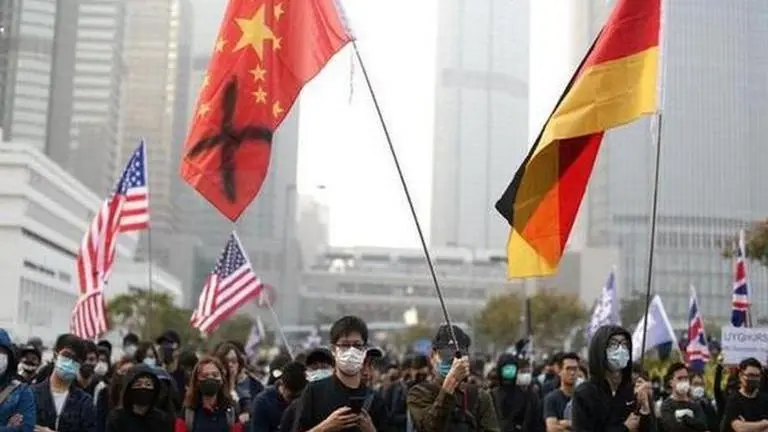Hong Kong: Protestors clash with riot police in a rally held in support of Uighur Muslims Hong Kong