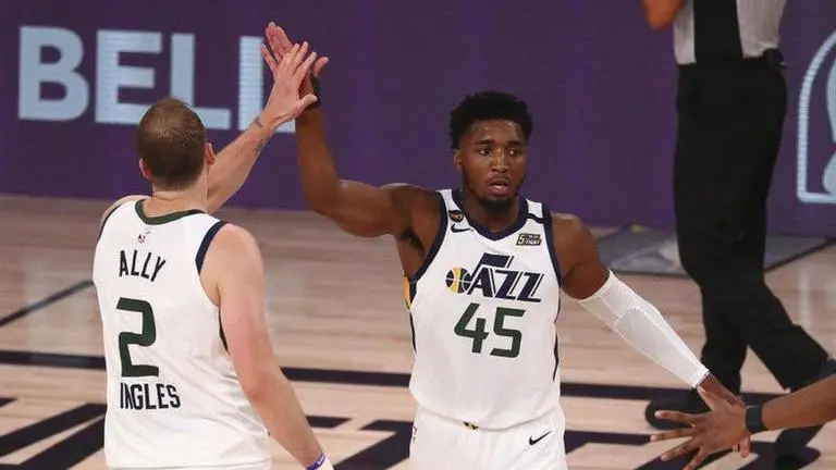 Donovan Mitchell helps Jazz beat Nuggets, tie series at 1