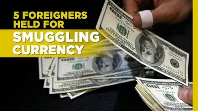 5 foreigners trying to smuggle nearly $500000 held at Delhi airport foreign nationals