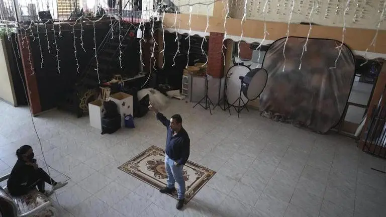 Pandemic forces Colombia family to live in banquet hall Pandemic forces Colombia family to live in banquet hall