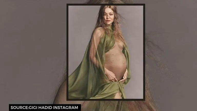 Gigi Hadid shows off 27 weeks baby bump in crop top and hat as she realises 'time flew' Gigi Hadid