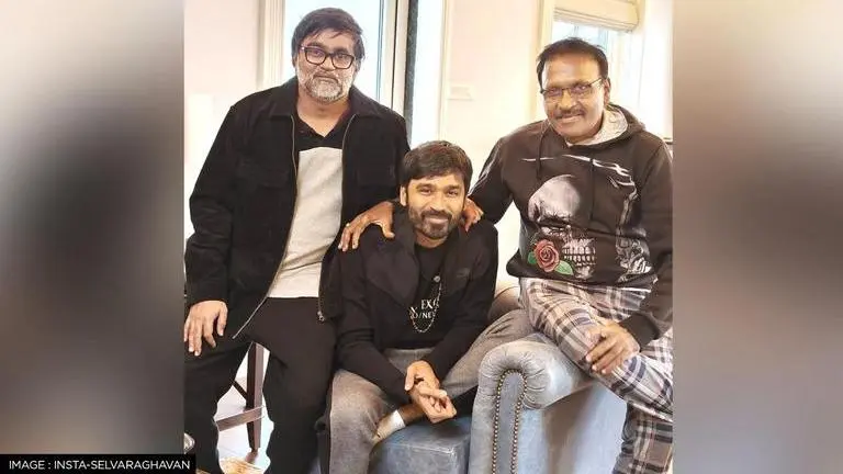 Dhanush embraces his brother & director Selvaraghavan on 'Naane Varuven' sets; See picture dhanush