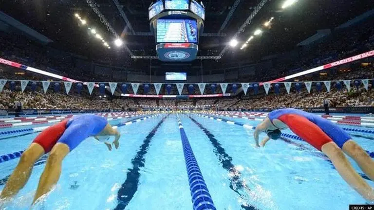 why do swimmers hit themselves