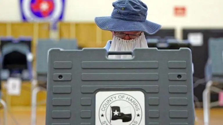 Texans vote in Senate runoff as virus rages