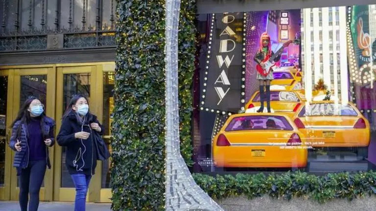 Virus keeps Black Friday crowds thin across the US