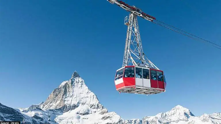 Switzerland: Helicopters used to evacuate nearly 300 tourists after cable car breaks down Swiss ski resort cable car
