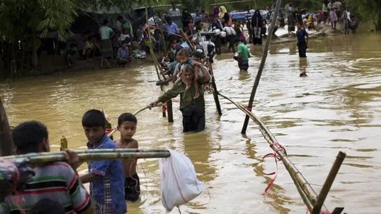 Malaysia searches for 24 Rohingya feared drowned off island