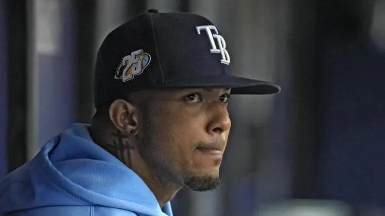 Tampa Bay Rays’ Wander Franco watches from the dugout