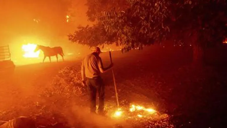 California wildfires rage, thousands evacuated