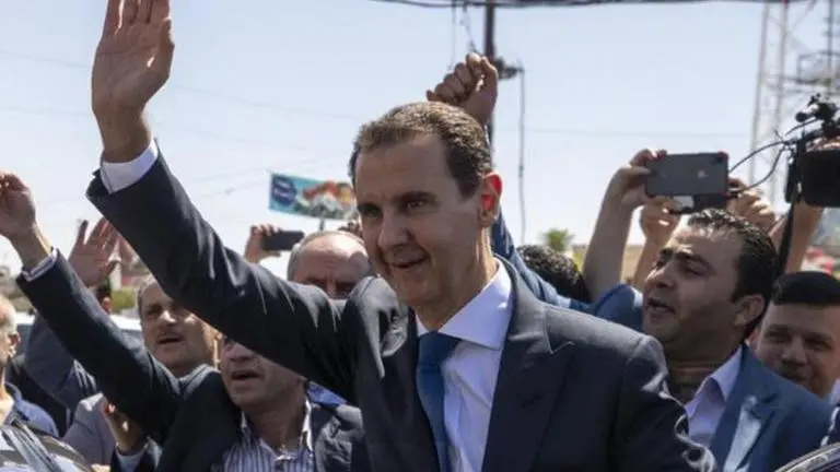 Syria's Assad names new Cabinet, few changes in ministries Bashar Assad