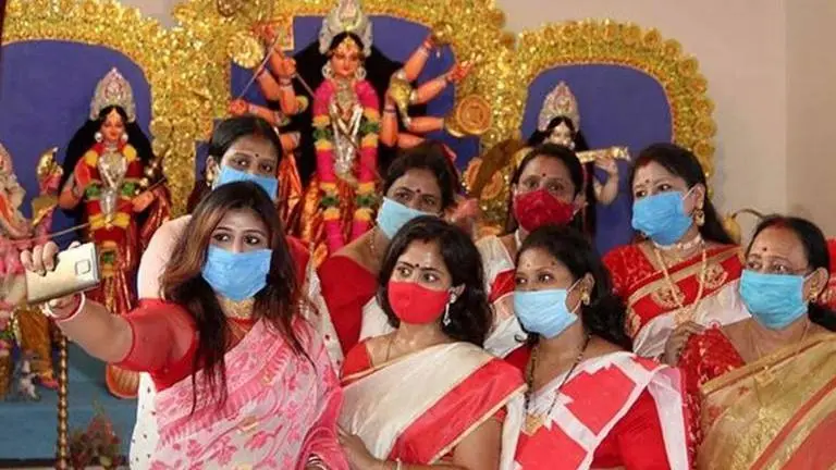 Women priests, 'dhakis' at Kolkata satellite township's first community Durga Puja Durga puja