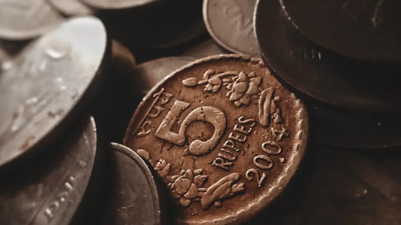 Rupee inches upward on dollar sales by exporters, foreign banks Rupee