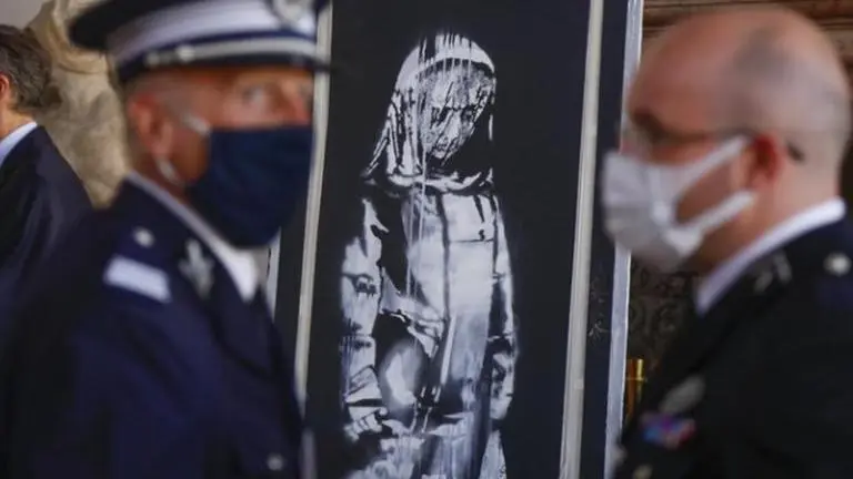 Italy returns stolen Banksy to France on Bastille Day