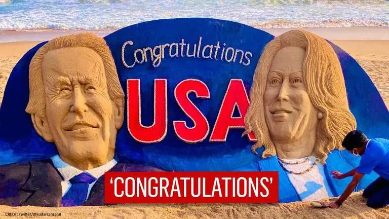 Sand artist creates 25 feet long sculpture to congratulate Biden, Harris for historic win Sand artist creates 25 ft long statue to congratulate Biden, Harris for 'historic win'