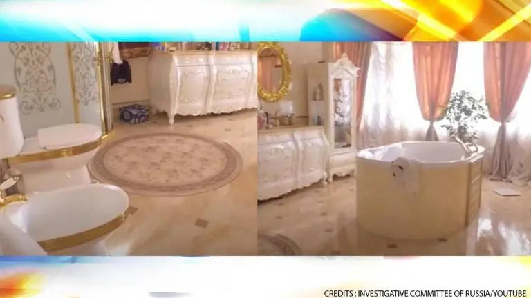 Golden toilet found in Russian police officer's mansion during corruption probe | WATCH Russia