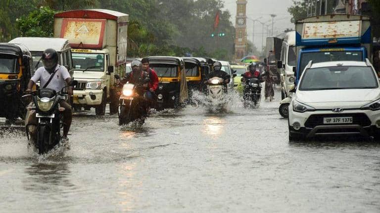 Mumbai Rains: Heavy rains inundate parts of city; rail & road traffic ...