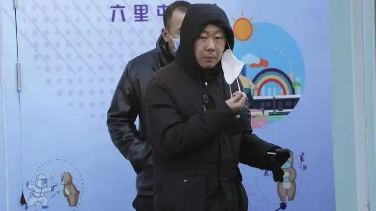 China allows home quarantine as COVID-19 curbs eased nationwide