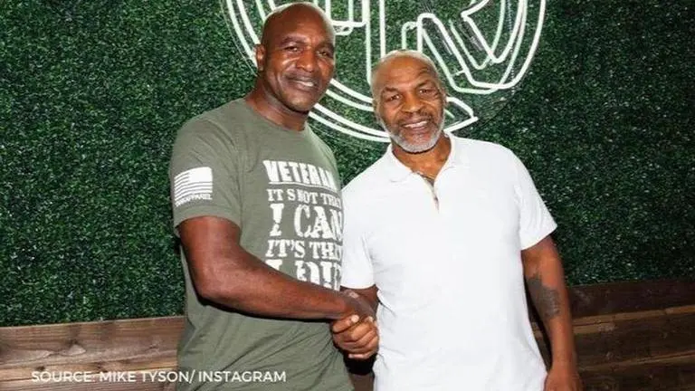 Evander Holyfield believes third fight with Mike Tyson would generate $100m in revenue Holyfield vs Tyson 3