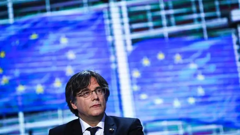Puigdemont says he'll attend extradition hearing Carles Puigdemont
