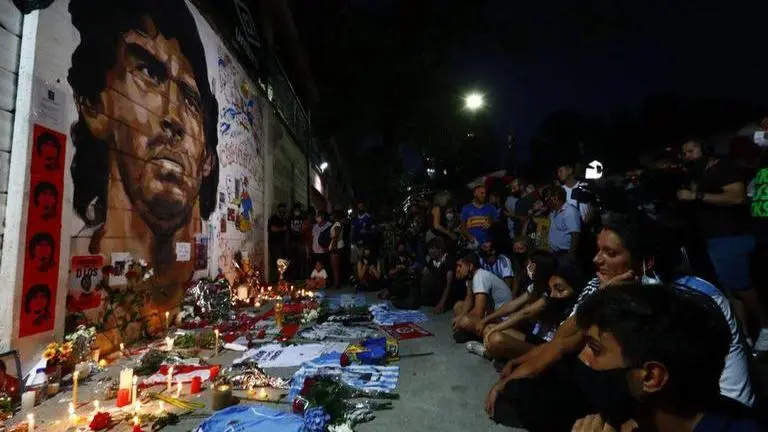 Drone footage as Maradona's cortege approaches cemetery