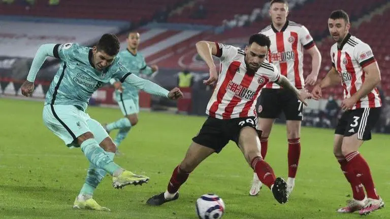 Liverpool beats Sheffield United 2-0 to end EPL losing run Liverpool beats Sheffield United 2-0 to end EPL losing run