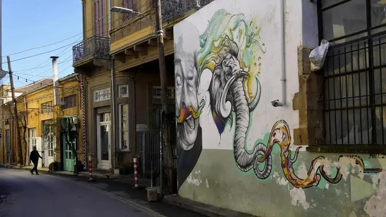 Turkish Cypriots attack UN peacekeepers trying to halt road work inside divided Cyprus’ buffer zone A man walks in a street in the old city of the Turkish occupied part of the divided capital Nicosia, Cyprus (Image: AP)