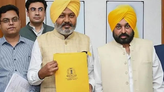 Punjab finance minister Harpal Singh Cheema with chief minister Bhagwant Mann