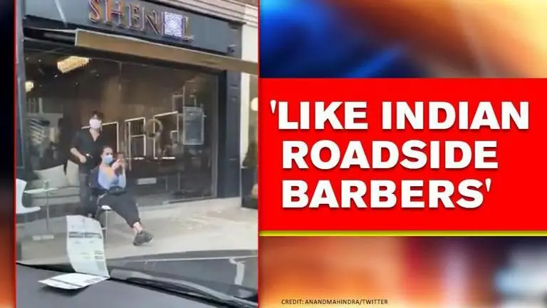 Anand Mahindra shares video of a UK barber working on roadside; Watch Anand Mahindra posts video of UK barber, says 'Empire's come to full circle'