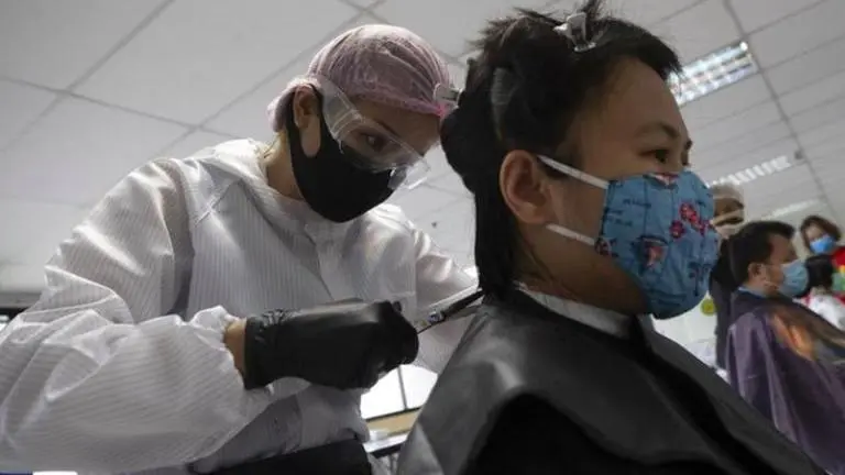 Hairdressers, beauty salons reopen in Malaysia