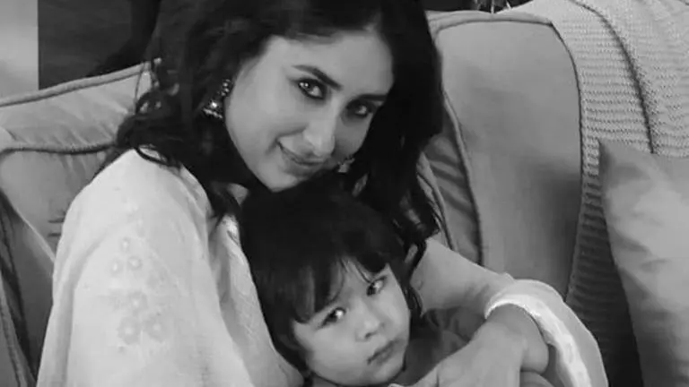 Kareena Kapoor shares adorable picture of Taimur, thanks 'official photographer' Arjun Kareena Kapoor shares adorable picture of Taimur while munching French fries
