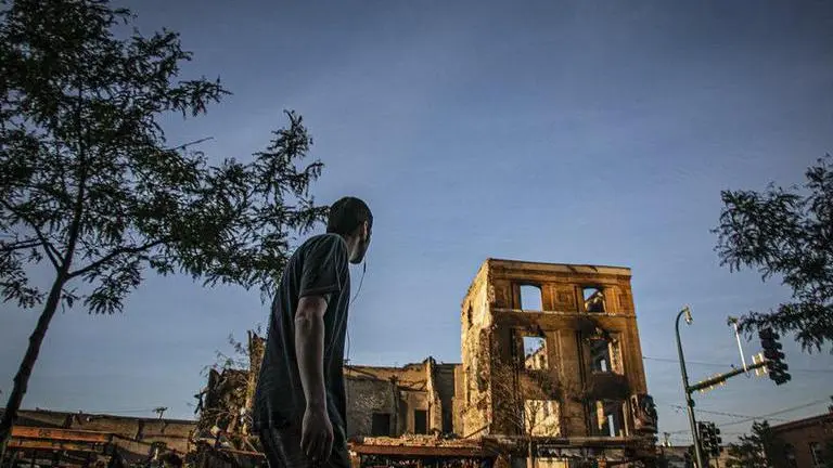 Unrest devastates landmark street of diversity