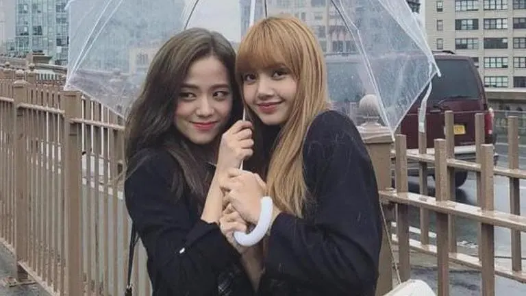 BLACKPINK Lisa nudges Jisoo to give spoiler about debut solo album mid-concert blackpink