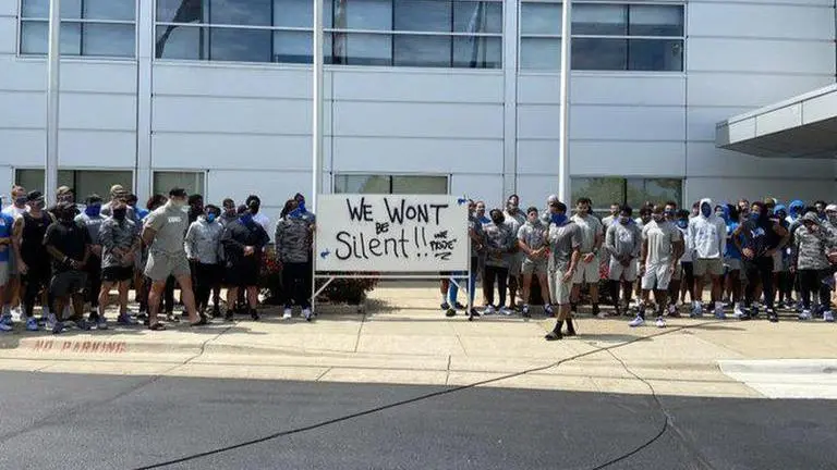 Black man shot by Wisconsin Police paralysed and 'fighting for his life', protests erupt Black Man