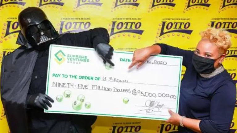 Lottery winner in Jamaica collects $95-million jackpot wearing Darth Vader's robe lottery