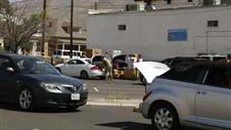 Cars line up for hours for drive through food bank