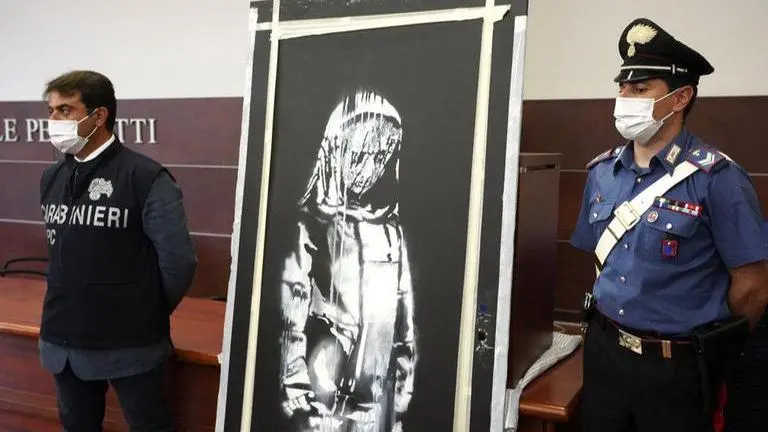 Banksy's stolen artwork commemorating Paris attack victims found in Italy Banksy