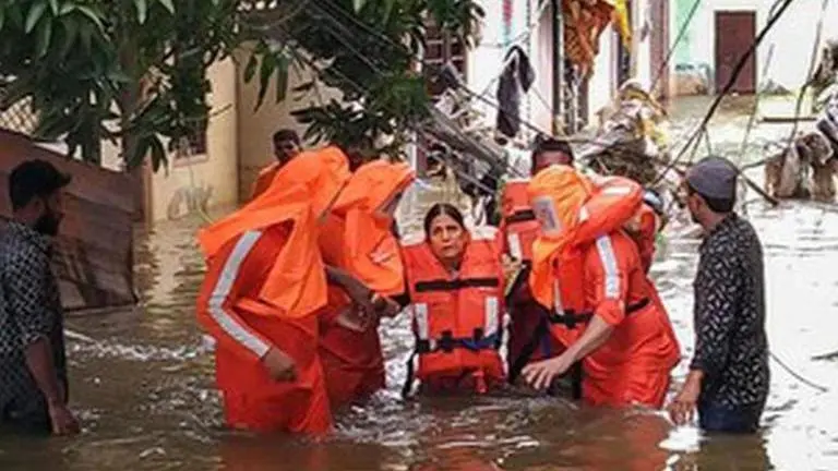 Army pressed into service in 4 flood-hit Karnataka districts; Chief Minister B S Yediyurappa to undertake aerial survey