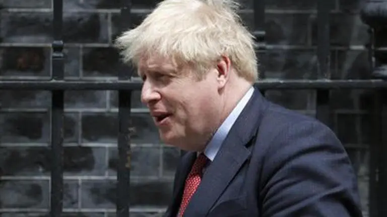 UK PM visits school ahead of September reopening