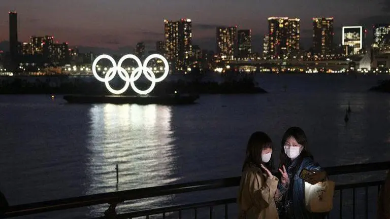 US Olympic CEO tells AP why she's not demanding games' delay