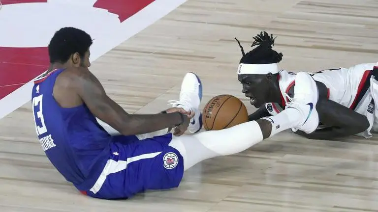 McGruder's late 3 helps Clippers edge Trail Blazers 122-120