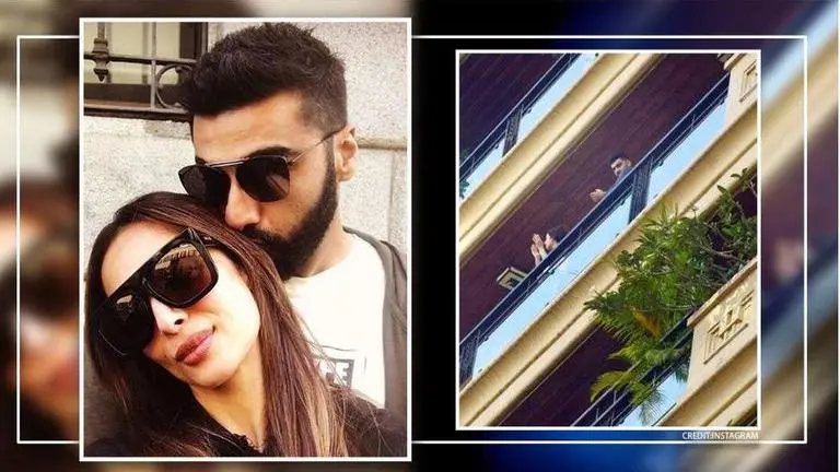 Janta Curfew: Arjun Kapoor, Malaika Arora socially distance as they applaud COVID fighters Janta Curfew