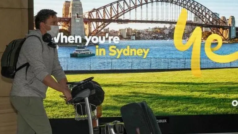 Australia to lift COVID restrictions despite reporting record number of Omicron infections Australia