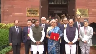 Budget 2024: Finance Minister Nirmala Sitharaman Dons a Cream-Blue Sari with Floral Border | WATCH Union Finance Minister Nirmala Sitharaman will present the interim budget today
