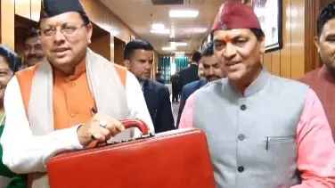 State Finance Minister Premchand Agarwal with Chief Minister Pushkar Singh Dhami