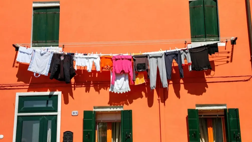 Drying Clothes In Harsh Sun After Washing? Here's How To Prevent Outfit Discolouration In Summer Clothes Drying