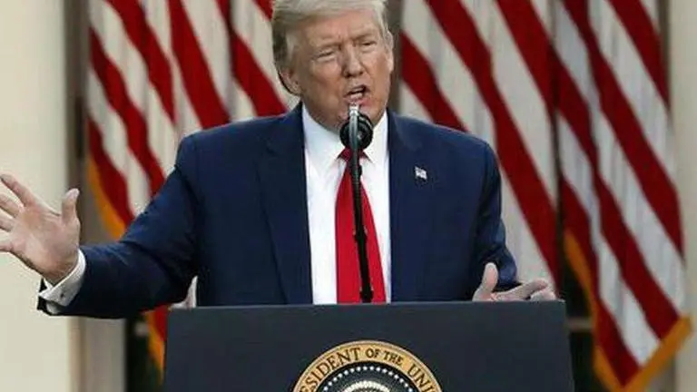 White House reporter apologizes to Trump for question