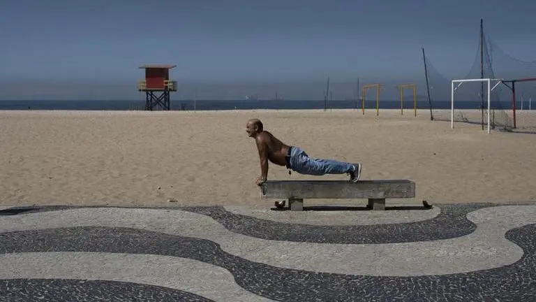 Virus restrictions eased on Rio de Janeiro beaches Virus restrictions eased on Rio de Janeiro beaches