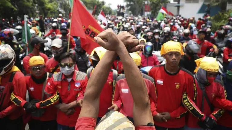 Indonesia students, workers rally against new labor law